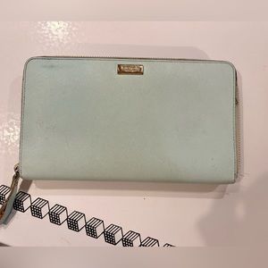 Kate spade travelers wallet very well loved.